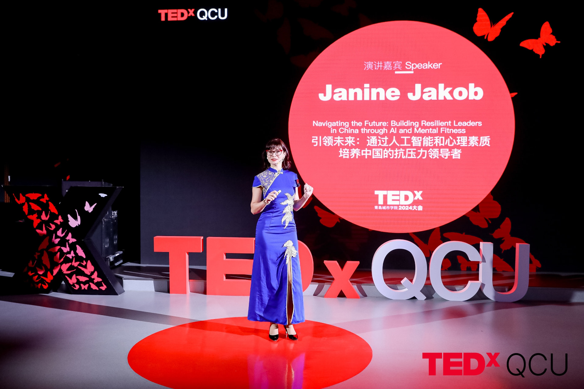 Janine Jakob delivering her TEDxQCU talk in Qingdao
